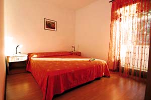 Apartmani Marko Novigrad - soba apartmana KIWI